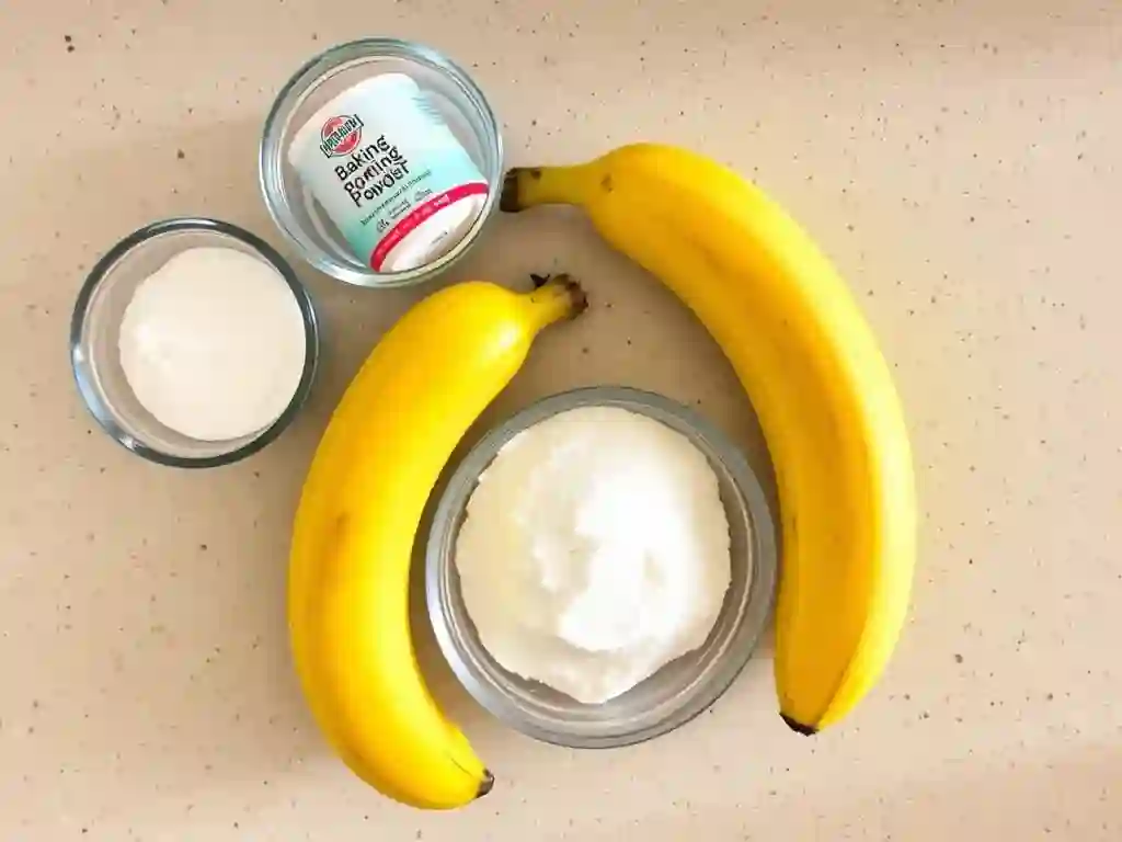 Ingredients for 3 ingredient banana bread: ripe bananas, baking powder, and sugar